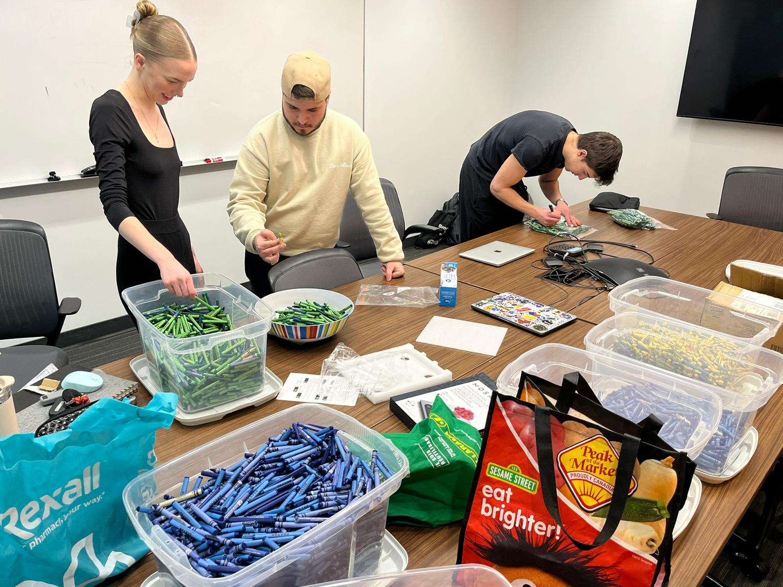 Students sorting crayons